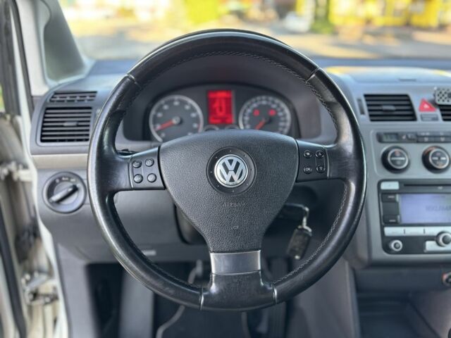 Серый Фольксваген Туран, объемом двигателя 1.4 л и пробегом 244 тыс. км за 6300 $, фото 7 на Automoto.ua