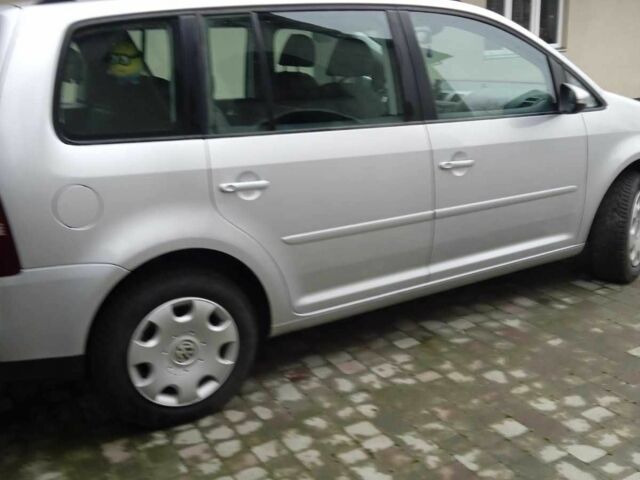 Серый Фольксваген Туран, объемом двигателя 1.9 л и пробегом 316 тыс. км за 8550 $, фото 4 на Automoto.ua