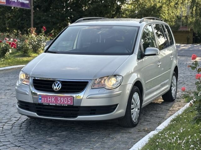 Серый Фольксваген Туран, объемом двигателя 1.4 л и пробегом 244 тыс. км за 6300 $, фото 2 на Automoto.ua