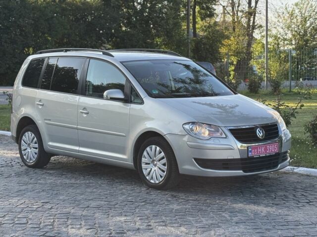 Серый Фольксваген Туран, объемом двигателя 1.4 л и пробегом 244 тыс. км за 6300 $, фото 3 на Automoto.ua