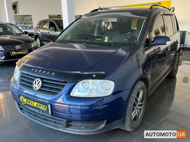 Синий Фольксваген Туран, объемом двигателя 2 л и пробегом 218 тыс. км за 6300 $, фото 2 на Automoto.ua