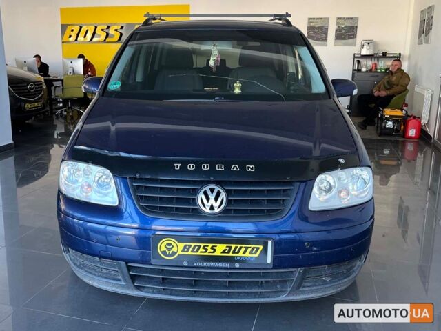Синий Фольксваген Туран, объемом двигателя 2 л и пробегом 218 тыс. км за 6300 $, фото 1 на Automoto.ua