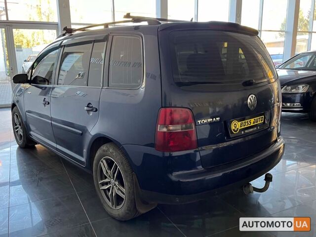 Синий Фольксваген Туран, объемом двигателя 2 л и пробегом 218 тыс. км за 6300 $, фото 4 на Automoto.ua