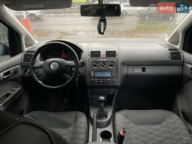 Синий Фольксваген Туран, объемом двигателя 1.9 л и пробегом 228 тыс. км за 3999 $, фото 9 на Automoto.ua
