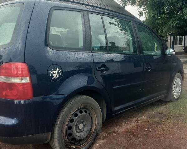 Синій Фольксваген Туран, об'ємом двигуна 1.6 л та пробігом 215 тис. км за 5800 $, фото 6 на Automoto.ua