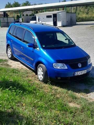 Синий Фольксваген Туран, объемом двигателя 1.6 л и пробегом 213 тыс. км за 5600 $, фото 5 на Automoto.ua