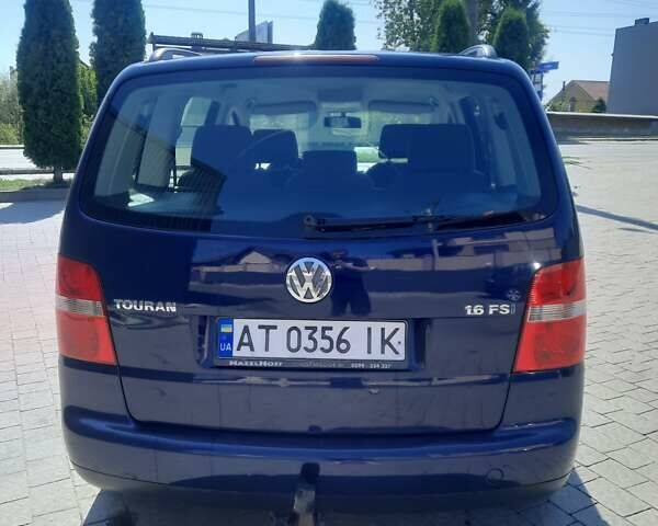 Синий Фольксваген Туран, объемом двигателя 1.6 л и пробегом 292 тыс. км за 5600 $, фото 4 на Automoto.ua