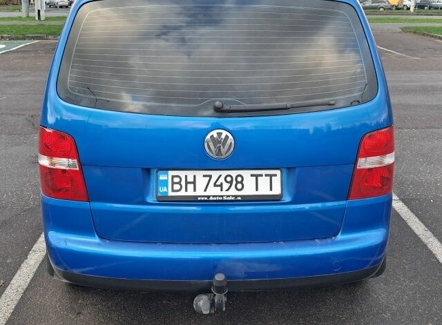 Синий Фольксваген Туран, объемом двигателя 1.6 л и пробегом 260 тыс. км за 5500 $, фото 3 на Automoto.ua