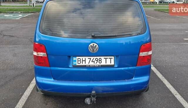 Синий Фольксваген Туран, объемом двигателя 1.6 л и пробегом 261 тыс. км за 5500 $, фото 1 на Automoto.ua