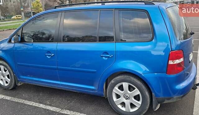 Синий Фольксваген Туран, объемом двигателя 1.6 л и пробегом 261 тыс. км за 5500 $, фото 2 на Automoto.ua