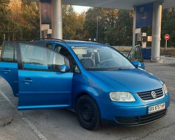 Синий Фольксваген Туран, объемом двигателя 1.6 л и пробегом 242 тыс. км за 5800 $, фото 4 на Automoto.ua