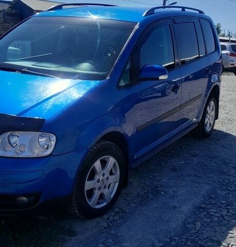 Синий Фольксваген Туран, объемом двигателя 1.6 л и пробегом 214 тыс. км за 5600 $, фото 5 на Automoto.ua