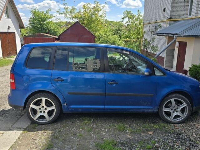 Синий Фольксваген Туран, объемом двигателя 1.6 л и пробегом 312 тыс. км за 5300 $, фото 3 на Automoto.ua