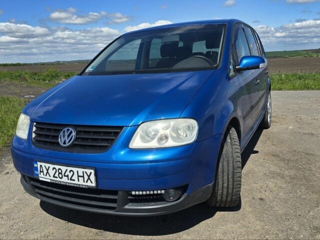 Синий Фольксваген Туран, объемом двигателя 1.6 л и пробегом 312 тыс. км за 5300 $, фото 1 на Automoto.ua