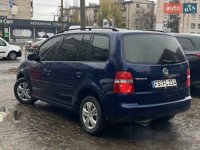 Синий Фольксваген Туран, объемом двигателя 1.9 л и пробегом 228 тыс. км за 3999 $, фото 5 на Automoto.ua