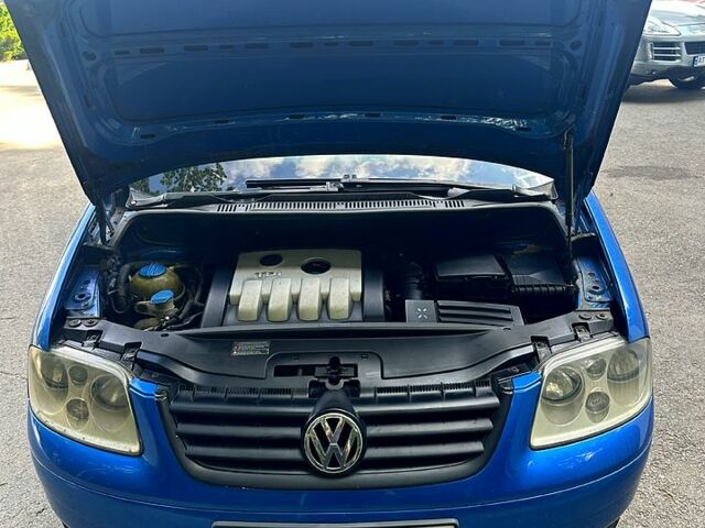 Синий Фольксваген Туран, объемом двигателя 2 л и пробегом 330 тыс. км за 5000 $, фото 9 на Automoto.ua