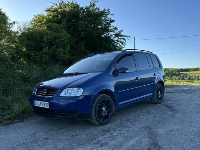 Синий Фольксваген Туран, объемом двигателя 1.6 л и пробегом 263 тыс. км за 6000 $, фото 5 на Automoto.ua