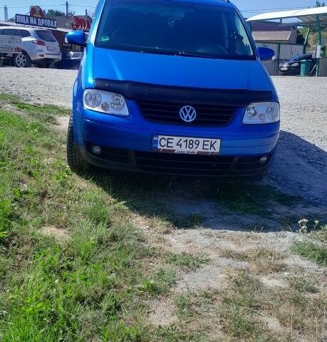 Синий Фольксваген Туран, объемом двигателя 1.6 л и пробегом 214 тыс. км за 5600 $, фото 4 на Automoto.ua