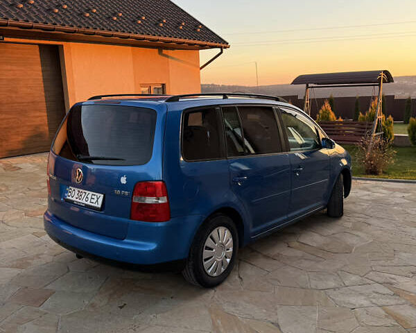 Синий Фольксваген Туран, объемом двигателя 1.6 л и пробегом 202 тыс. км за 4900 $, фото 2 на Automoto.ua