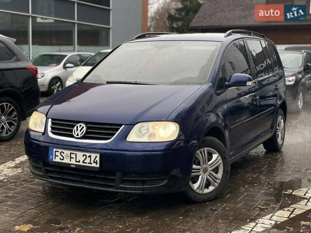 Синий Фольксваген Туран, объемом двигателя 1.9 л и пробегом 228 тыс. км за 3999 $, фото 2 на Automoto.ua