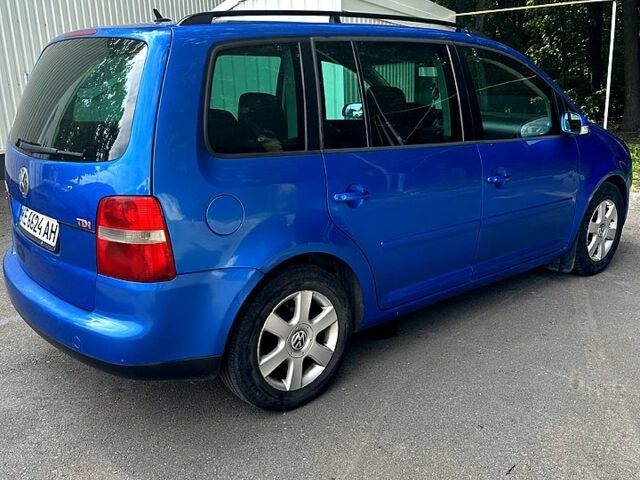 Синий Фольксваген Туран, объемом двигателя 2 л и пробегом 330 тыс. км за 5000 $, фото 2 на Automoto.ua