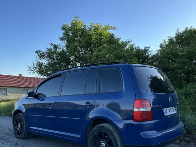 Синий Фольксваген Туран, объемом двигателя 1.6 л и пробегом 263 тыс. км за 6000 $, фото 7 на Automoto.ua