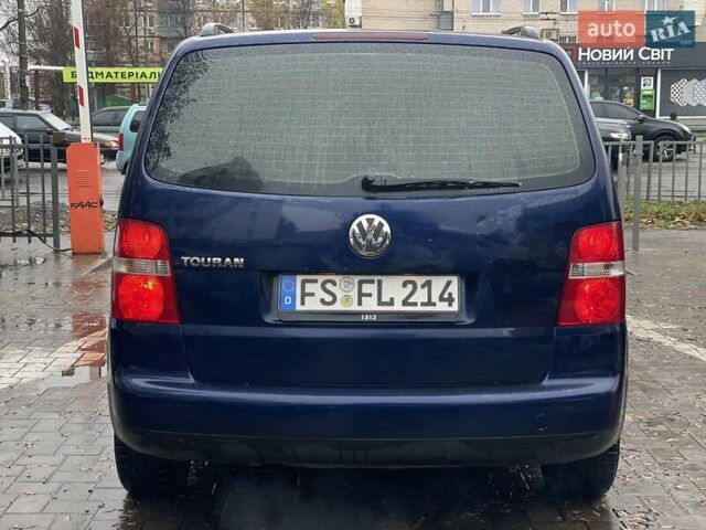 Синий Фольксваген Туран, объемом двигателя 1.9 л и пробегом 228 тыс. км за 3999 $, фото 4 на Automoto.ua