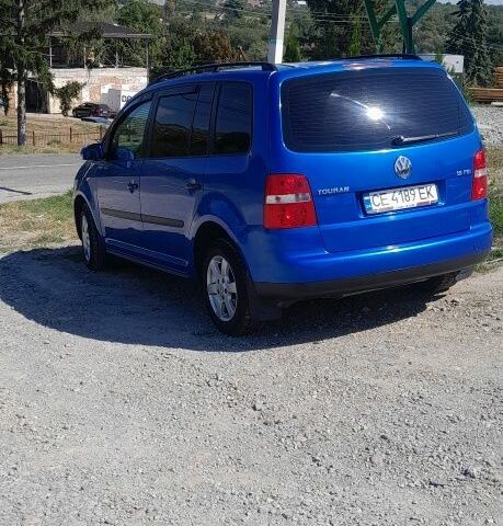 Синий Фольксваген Туран, объемом двигателя 1.6 л и пробегом 214 тыс. км за 5600 $, фото 3 на Automoto.ua