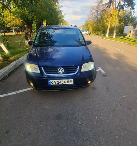 Синий Фольксваген Туран, объемом двигателя 1.98 л и пробегом 391 тыс. км за 4300 $, фото 3 на Automoto.ua