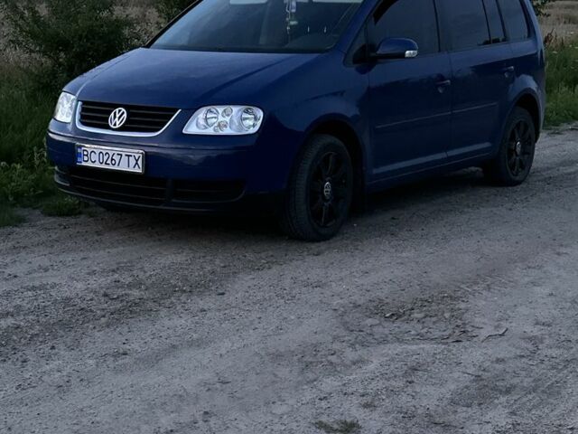 Синий Фольксваген Туран, объемом двигателя 1.6 л и пробегом 263 тыс. км за 6000 $, фото 2 на Automoto.ua