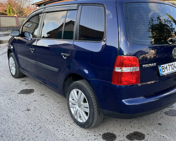 Синій Фольксваген Туран, об'ємом двигуна 1.6 л та пробігом 260 тис. км за 5500 $, фото 4 на Automoto.ua