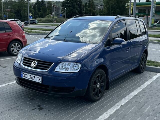 Синий Фольксваген Туран, объемом двигателя 1.6 л и пробегом 263 тыс. км за 6000 $, фото 1 на Automoto.ua