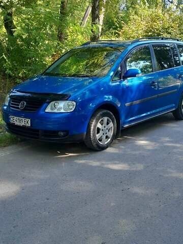 Синий Фольксваген Туран, объемом двигателя 1.6 л и пробегом 213 тыс. км за 5600 $, фото 1 на Automoto.ua