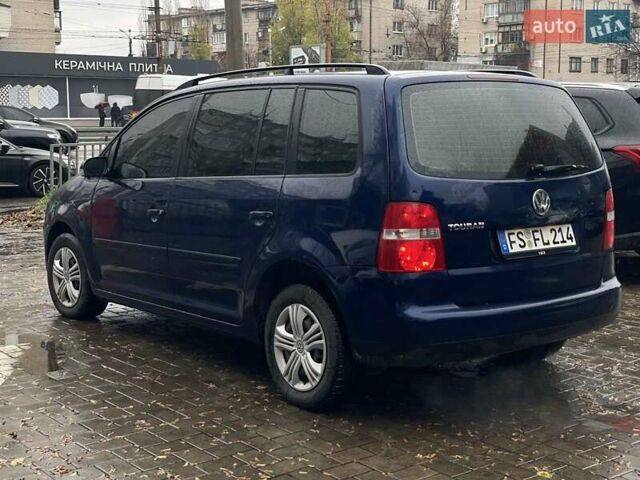 Синий Фольксваген Туран, объемом двигателя 1.9 л и пробегом 228 тыс. км за 3999 $, фото 23 на Automoto.ua