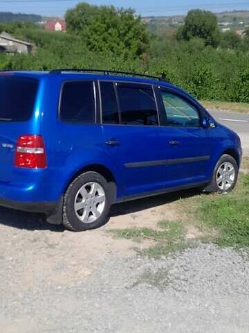 Синий Фольксваген Туран, объемом двигателя 1.6 л и пробегом 213 тыс. км за 5600 $, фото 3 на Automoto.ua