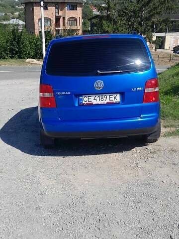 Синий Фольксваген Туран, объемом двигателя 1.6 л и пробегом 213 тыс. км за 5600 $, фото 4 на Automoto.ua