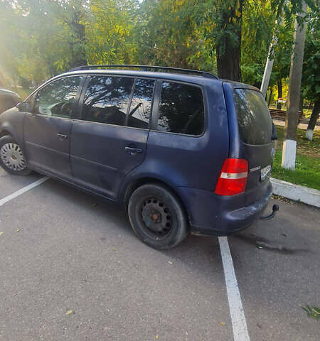 Синий Фольксваген Туран, объемом двигателя 1.98 л и пробегом 391 тыс. км за 4300 $, фото 19 на Automoto.ua