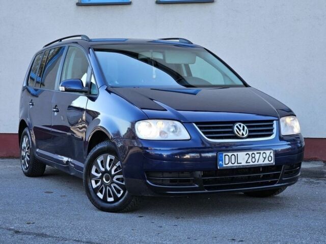 Синий Фольксваген Туран, объемом двигателя 1.9 л и пробегом 240 тыс. км за 1700 $, фото 2 на Automoto.ua