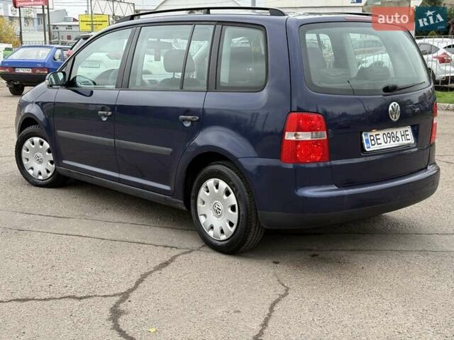 Синий Фольксваген Туран, объемом двигателя 1.6 л и пробегом 246 тыс. км за 5800 $, фото 5 на Automoto.ua