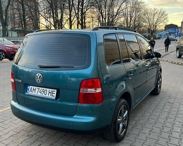 Синій Фольксваген Туран, об'ємом двигуна 1.6 л та пробігом 300 тис. км за 5000 $, фото 11 на Automoto.ua