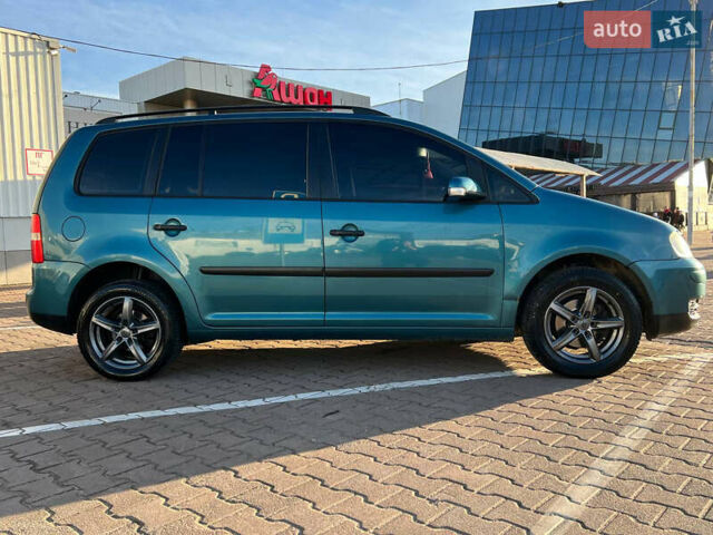 Синій Фольксваген Туран, об'ємом двигуна 1.6 л та пробігом 300 тис. км за 5000 $, фото 10 на Automoto.ua