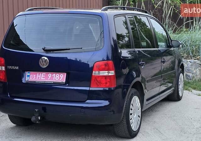 Синий Фольксваген Туран, объемом двигателя 1.6 л и пробегом 262 тыс. км за 6499 $, фото 22 на Automoto.ua
