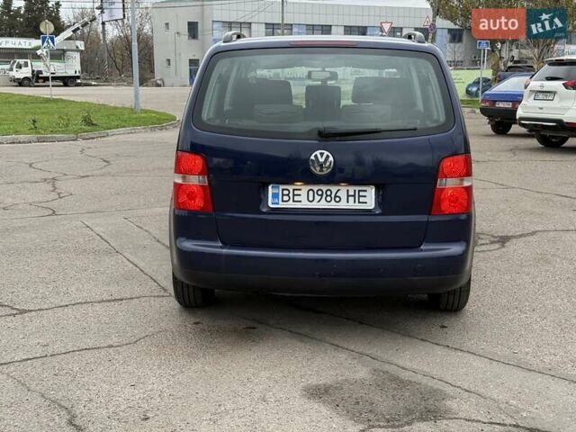 Синий Фольксваген Туран, объемом двигателя 1.6 л и пробегом 246 тыс. км за 5800 $, фото 4 на Automoto.ua