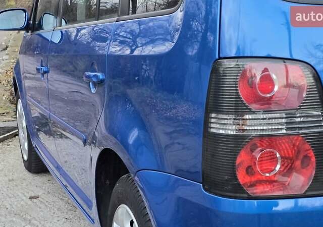 Синій Фольксваген Туран, об'ємом двигуна 1.6 л та пробігом 221 тис. км за 6399 $, фото 23 на Automoto.ua