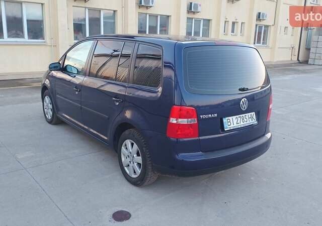 Синий Фольксваген Туран, объемом двигателя 1.6 л и пробегом 220 тыс. км за 6500 $, фото 1 на Automoto.ua