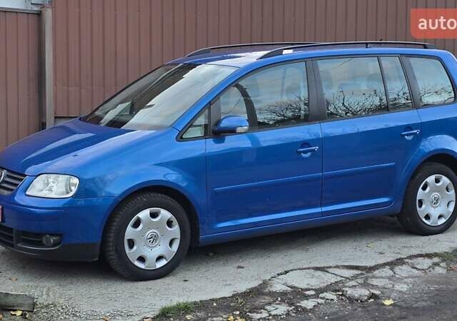 Синий Фольксваген Туран, объемом двигателя 1.6 л и пробегом 221 тыс. км за 6399 $, фото 35 на Automoto.ua