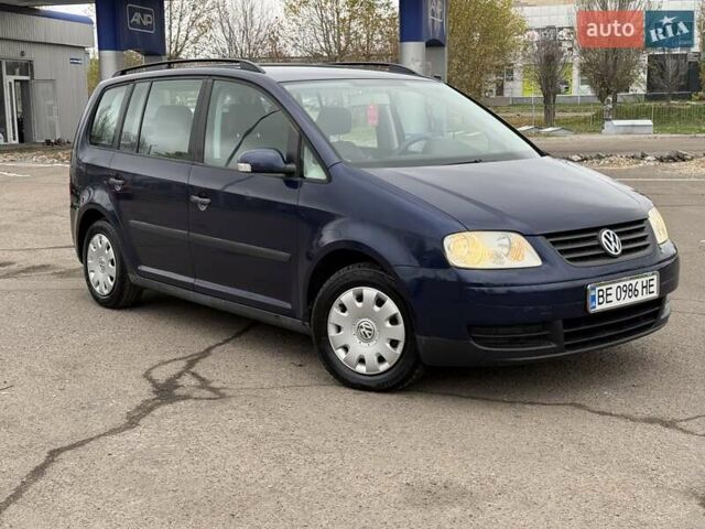 Синий Фольксваген Туран, объемом двигателя 1.6 л и пробегом 246 тыс. км за 5800 $, фото 2 на Automoto.ua