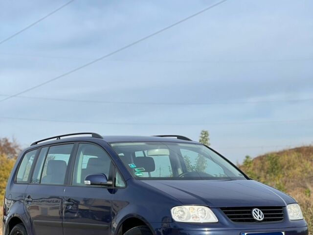 Синий Фольксваген Туран, объемом двигателя 2 л и пробегом 300 тыс. км за 2800 $, фото 1 на Automoto.ua