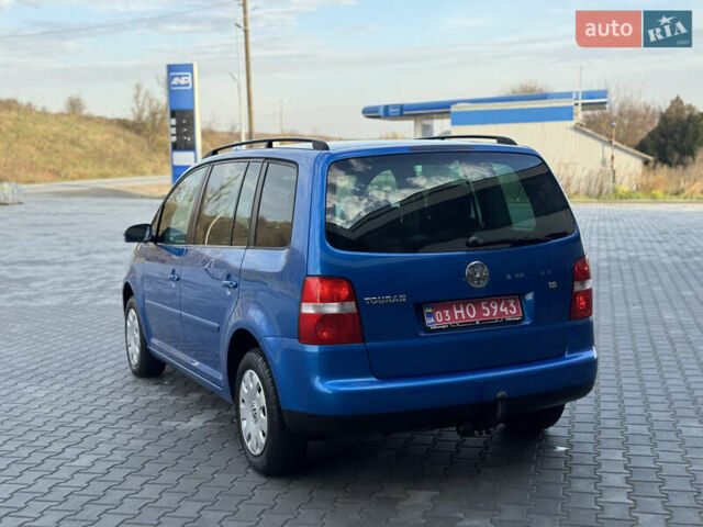 Синий Фольксваген Туран, объемом двигателя 1.6 л и пробегом 250 тыс. км за 5450 $, фото 3 на Automoto.ua