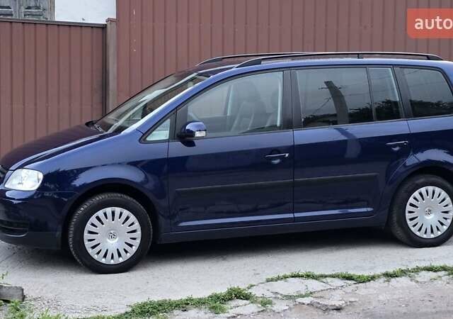 Синий Фольксваген Туран, объемом двигателя 1.6 л и пробегом 262 тыс. км за 6499 $, фото 34 на Automoto.ua